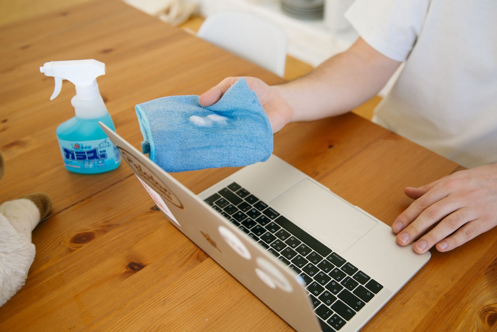 Classic 500 GSM microfiber cloth wiping a laptop