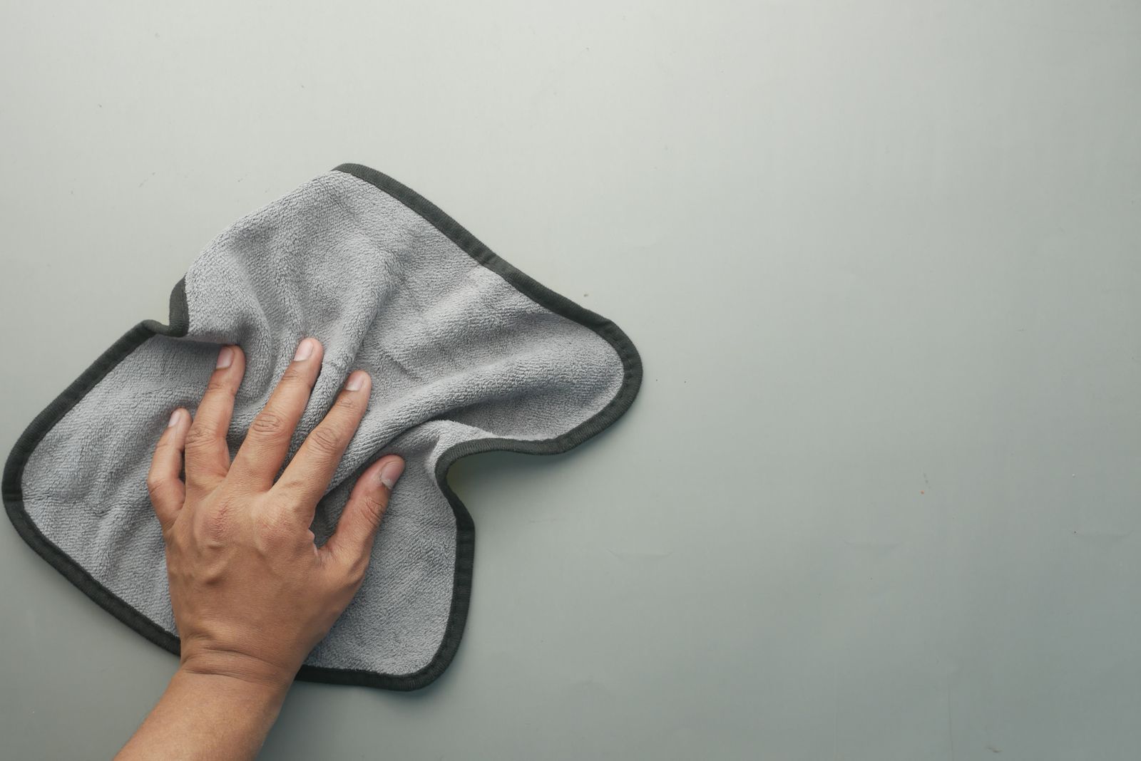Elite 800 GSM plush microfiber cloth pressed on a car panel